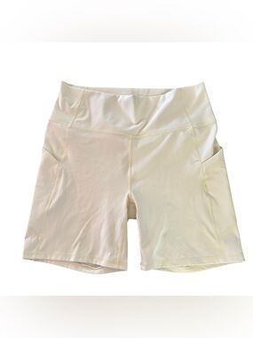 Fabletics pale yellow bike shorts size medium